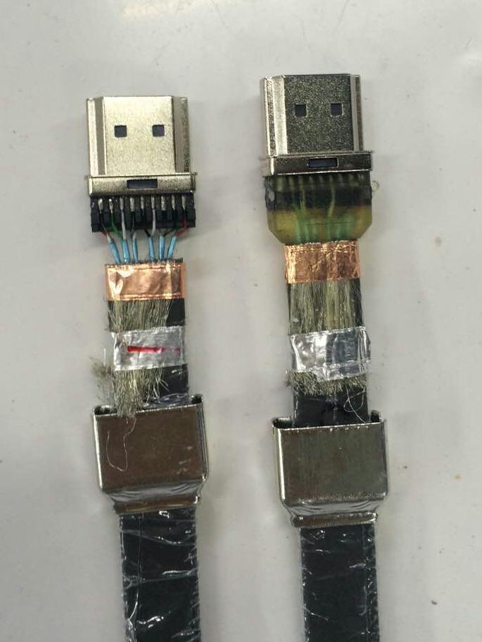 High-speed cable connector assemblies with exposed interconnect regions